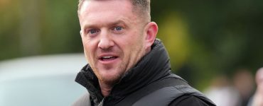 Tommy Robinson charged with terror offence after failing to provide phone password