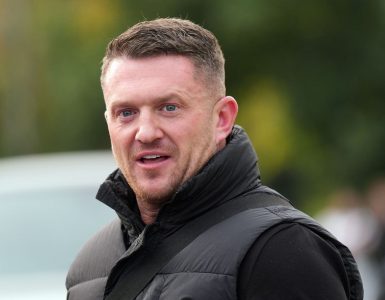 Tommy Robinson charged with terror offence after failing to provide phone password