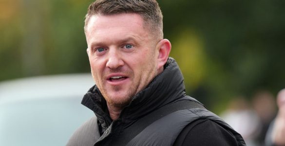 Tommy Robinson charged with terror offence after failing to provide phone password